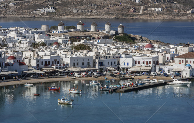 Greece, Cyclades Islands, Mykonos, Chora - May 16, 2007: Greece, Cyclades Islands, Mykonos, Chora, Fishing boats in harbor and white houses