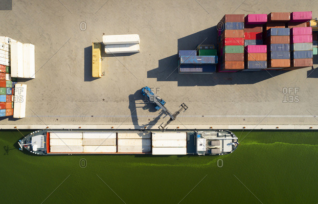 Containers stored in a terminal, bordering the IJsselmeer lake, Flevoland, Netherlands
