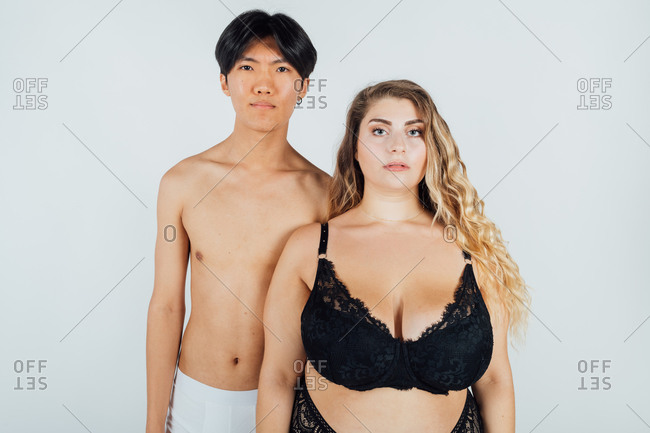 Portrait of a young couple wearing underwear