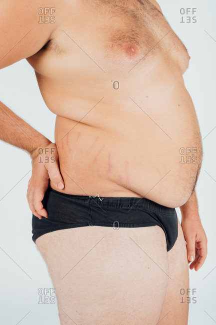 Man wearing underpants, neck down