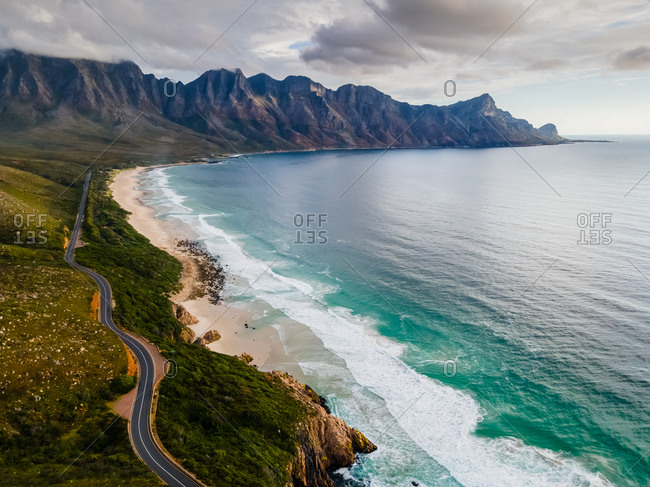 Aerial view of scenic coastal drive Clarens Drive and Kogel Bay beach, between Gordon's Bay and Rooi Els, after rain storm, Cape Town, South Africa
