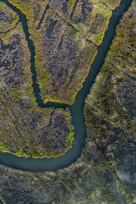 Aerial view of a marshland part of estuary of river Vouga, in Ria de Aveiro, Bioria, Salreu, Estarrega, Aveiro, Portugal