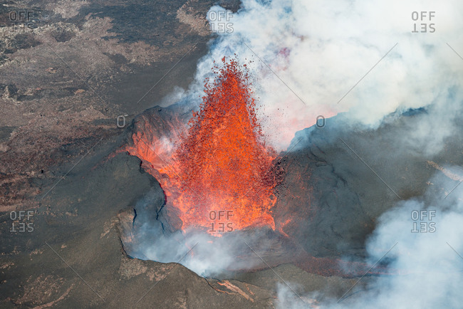 Aerial view of crater with spewing lava, smoke and gases during the largest volcanic eruption in Iceland since 1784, Holuhraun, highlands of Iceland