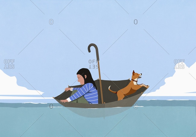 Woman and dog in umbrella floating on sea
