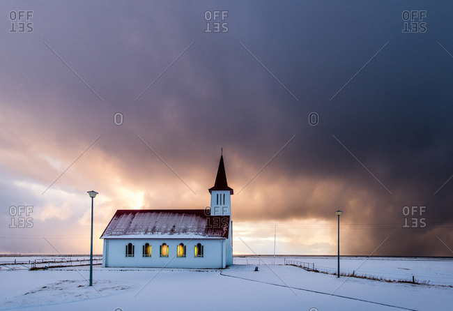 A red-roof church on the coast of Iceland in the winter