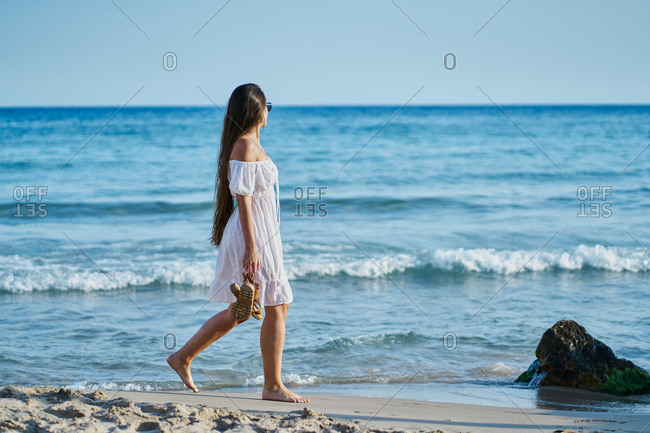 Girl In White Dress On Beach Stock Photo, Picture And, 50% OFF