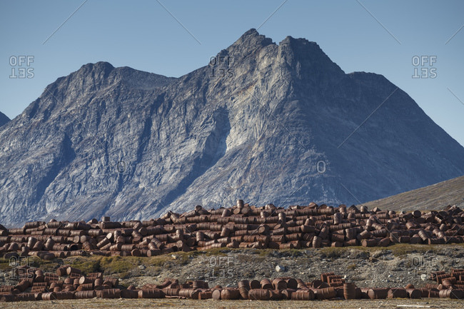 Piles of rusting fuel drums of abandoned US WW2 base Bluie East Two, Ikateq, Greenland