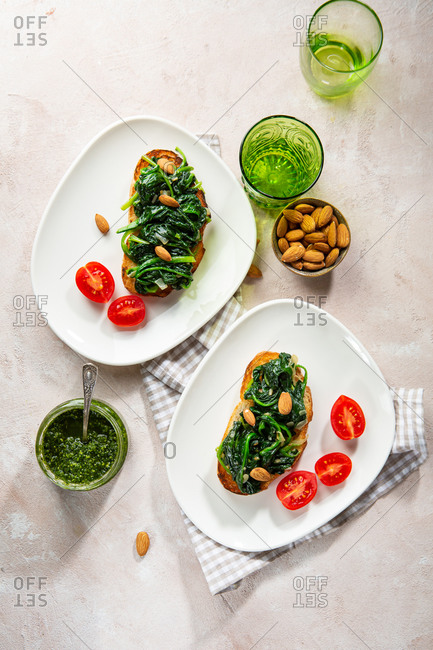 Overhead view of toast with sauteed spinach