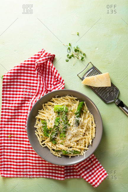 Spring pasta dish with asparagus and parmesan cheese