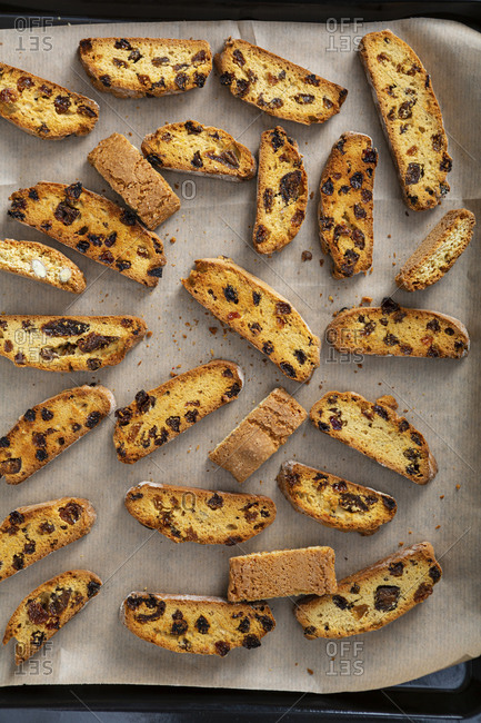 Overhead view of dried fruit biscotti on baking tray