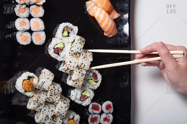 Assortment of Sushi Roll Set on a Black Tray. Japanese Food Stock