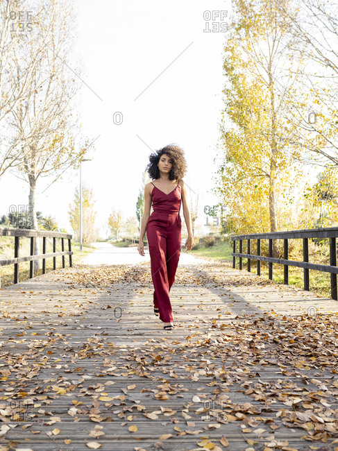 Blond Female In Black Trendy Jumpsuit Posing Near Big Cactus. Bohemian  Style. Hippie Woman Stock Photo, Picture and Royalty Free Image. Image  94753646.