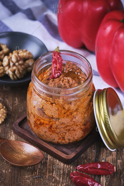 Vegan walnut and red pepper hummus in crystal jar