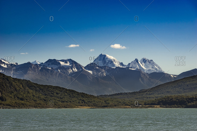 Scenic view of snowcapped mountains by beagle channel, tierra del fuego national park, ushuaia, patagonia, argentina