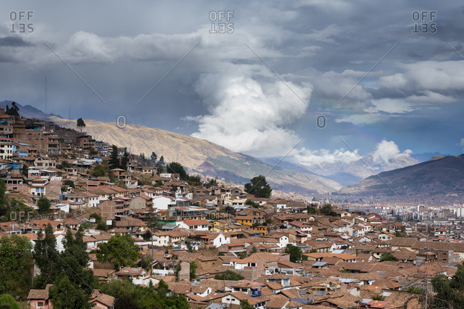 Elevated view of cusco city with mountains in background, peru