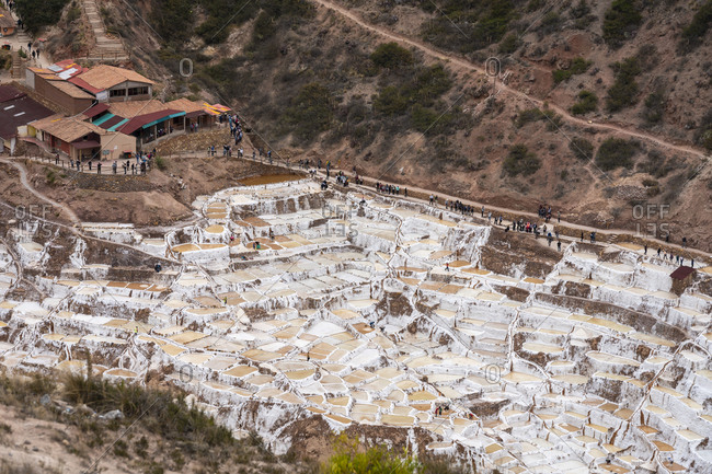 Aerial view of salt mines at salineras de maras, sacred valley, peru