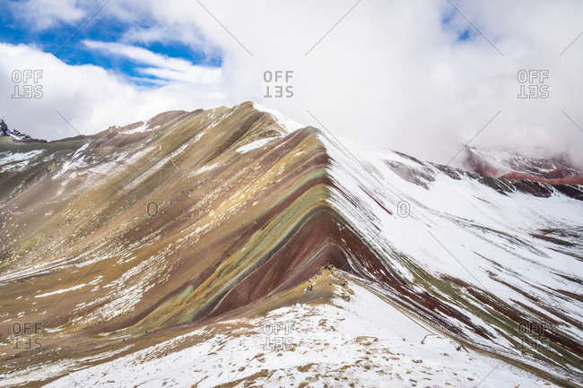 Idyllic shot of rainbow mountain during winter, pitumarca, peru