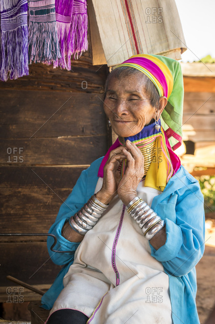 Loikaw, kayah state, myanmar (burma) - january 23, 2018: portrait of senior burmese woman from kayan tribe, loikaw, myanmar