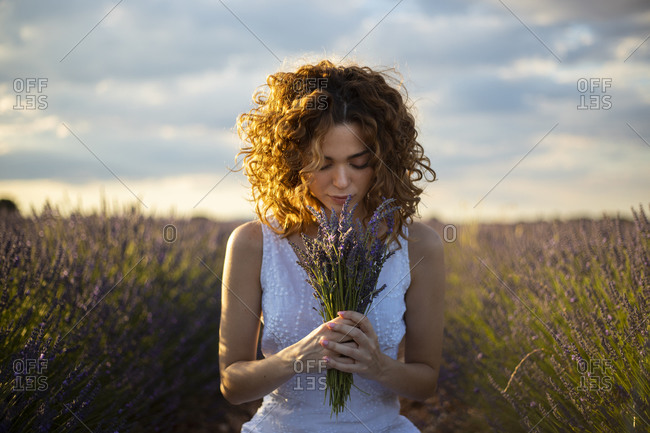 Pretty woman in a lavender field