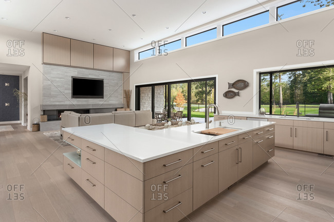 Spacious kitchen and living room in new contemporary style luxury home