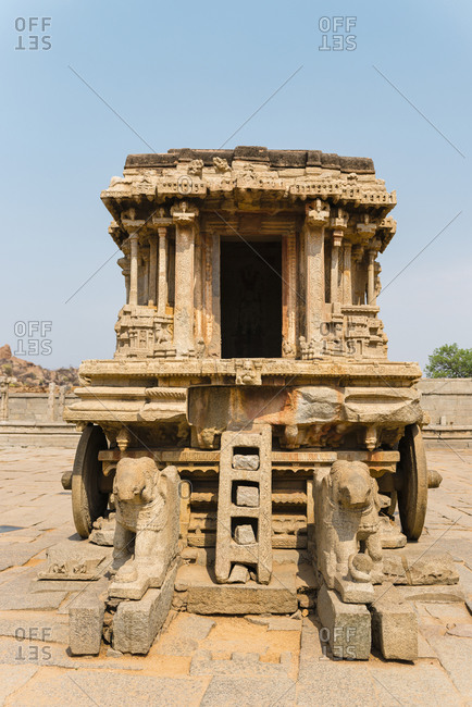 Chariot carved in the granite in Vijaya Vitthala Temple complex in desert valley of Hampi, Karnataka, India