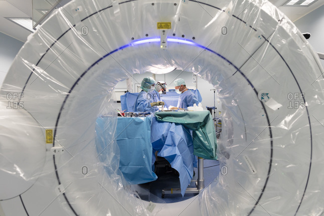 Two surgeons in the operating room face each other