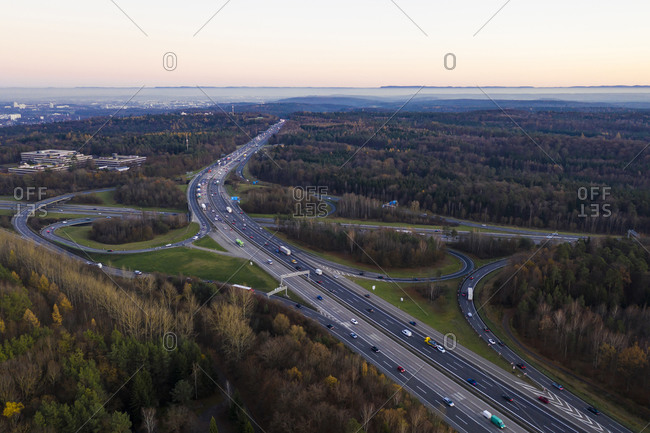 Germany- Baden-Wurttemberg- Stuttgart- Aerial view of traffic on Bundesautobahn 8 at dusk