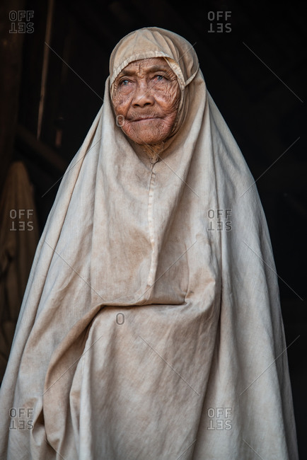 Portrait, Kratie Province, Cambodia - 26 February 2013: Muslim Woman Adorns A Full Hijab Style Gown In A Minority Village Of Ethnic Cham People.