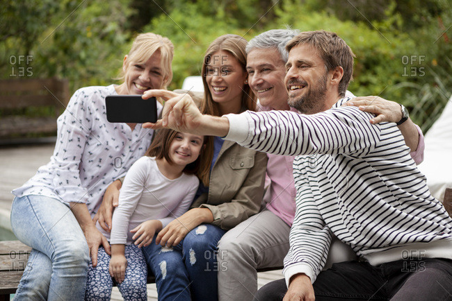 Happy loving family taking selfie