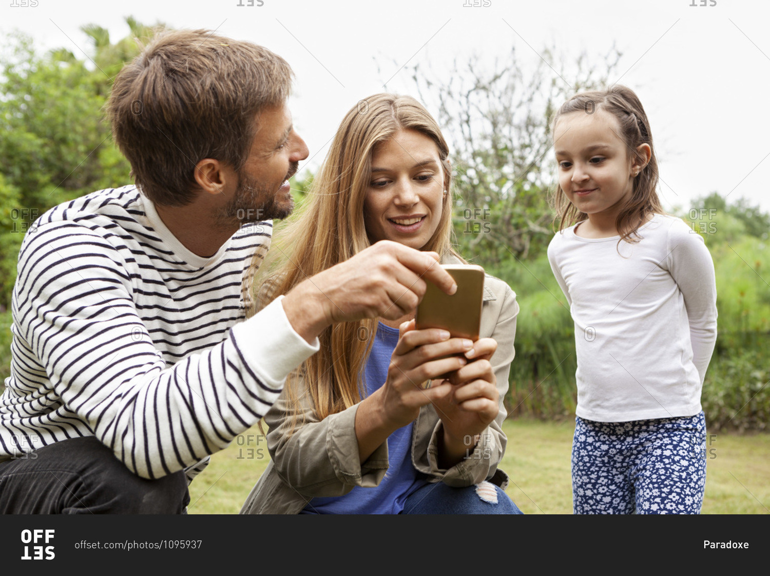 Happy Happy Family using smartphone