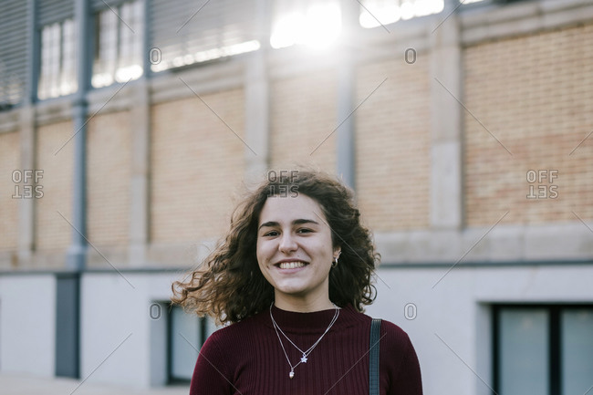 Portrait of young caucasian college woman on college campus