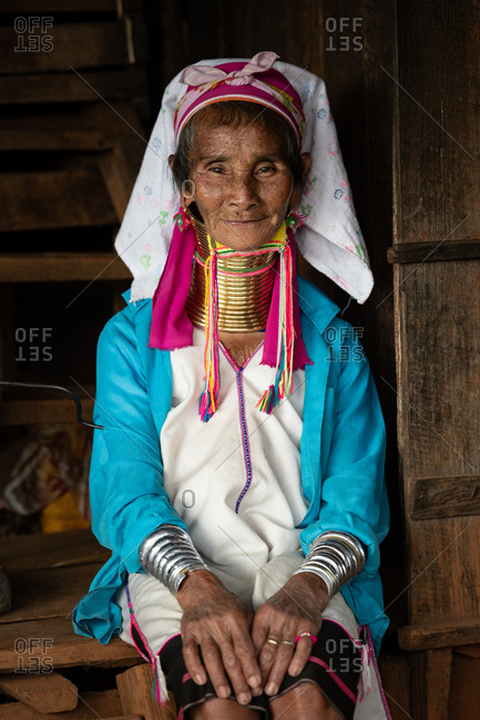 PADUANG PEOPLE,  HILL TRIBE, PAN PET VILLAGE, KAYAH STATE, MYANMAR - 28 January 2019: Portrait of local lady wearing brass coils placed around the neck, appearing to lengthen it.