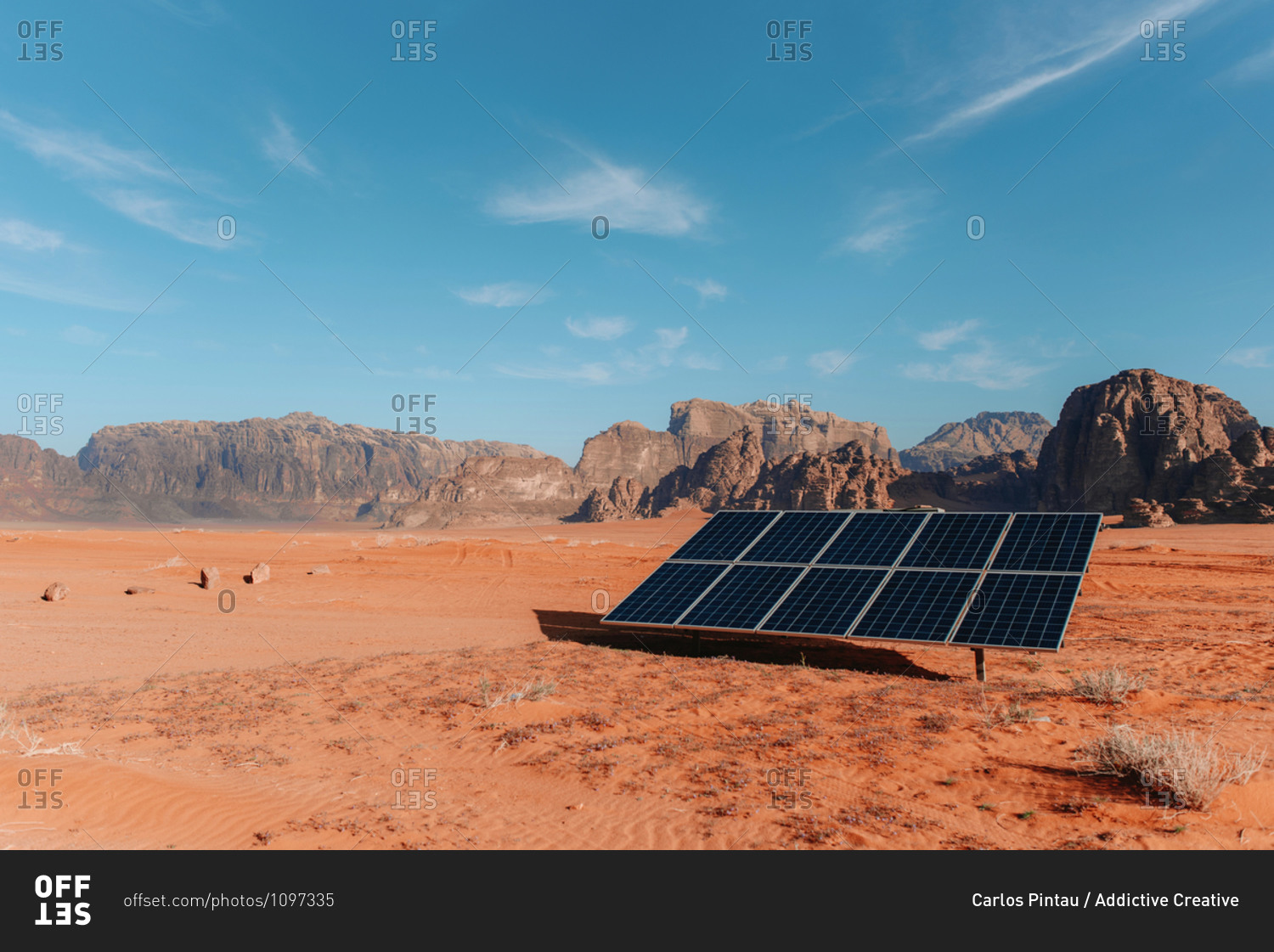 Panel of modern solar battery installed on dry ground in Wadi Rum valley on sunny day