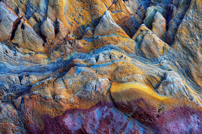 Texture patterns and colors on a cliff of a beach in Asturias