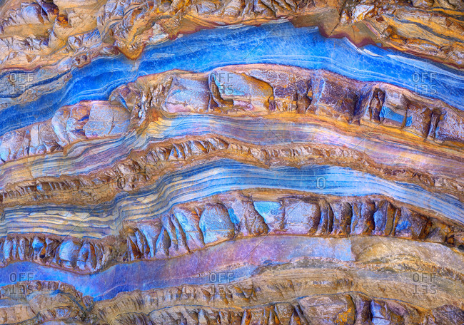 Texture patterns and colors on a cliff of a beach in Asturias