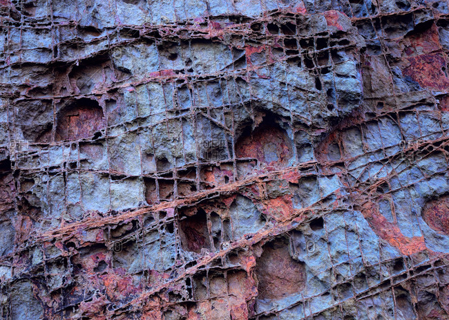Strange texture with rectilinear patterns on a cliff in Asturias