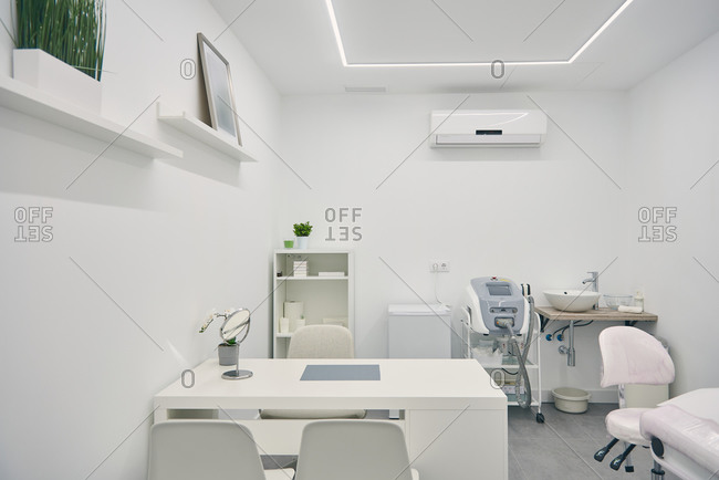 Stylish interior of room of modern beauty center in white color and minimal style