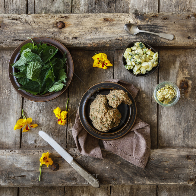 Potato salad- fresh nettle- herb butter and yellow flower heads