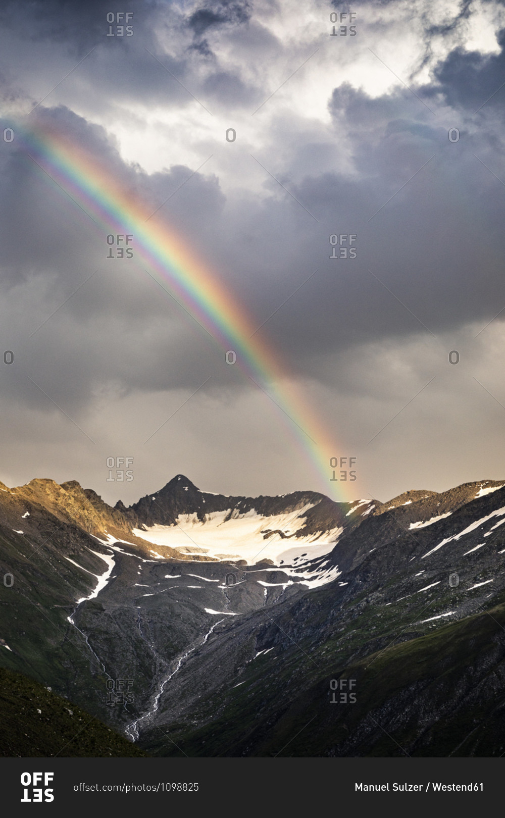 Rainbow in mountain landscape overview