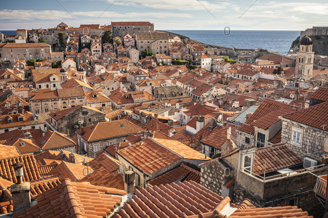 Elevated view over pretty red rooftops of town and sea, Gustavia