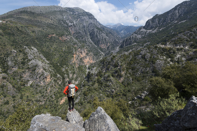 A man hiking in the Taygetos mountains on the Mani peninsula in the Peloponnese in Greece