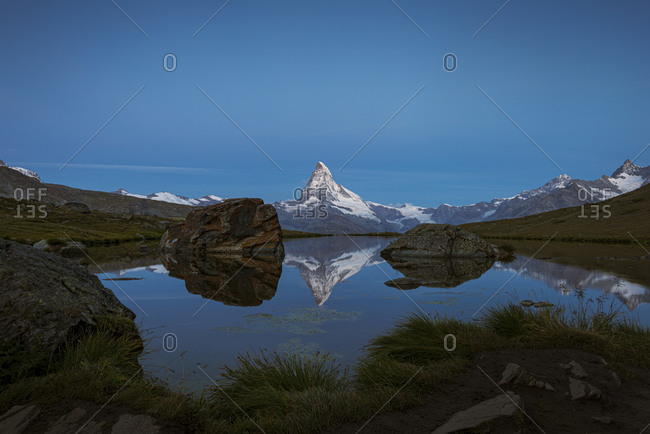 The Matterhorn reflected in Stellisee lake in the Swiss Alps