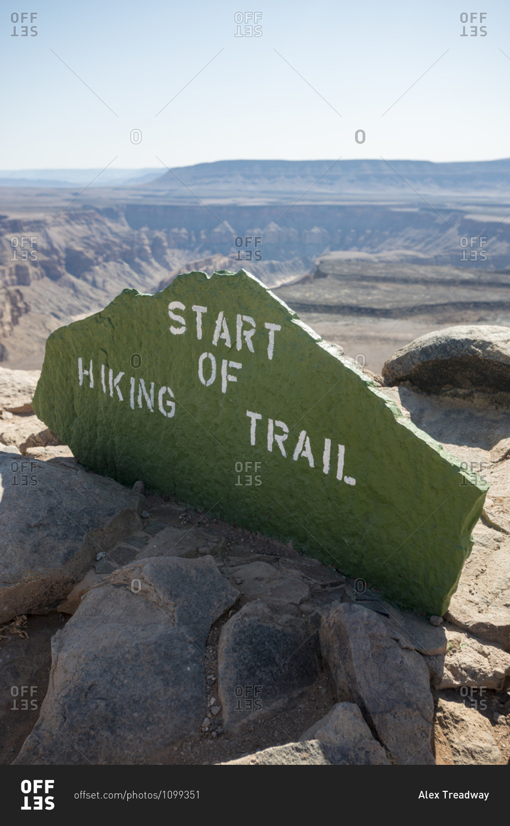 A stone sign marks the beginning of the hiking trail into the Fish River Canyon in Namibia