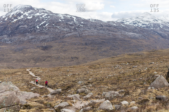 Hiking in the Scottish Highlands in Torridon along The Cape Wrath Trail towards Loch Coire Mhic Fhearchair