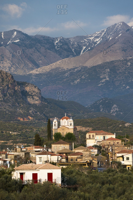 A church in a village near Kardamili in the Peloponnese in Greece with the Taygetos mountains behind