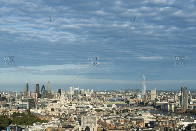 London,  United Kingdom - August 21, 2015: A view of London and the Thames river from the top of Centre Point tower. The Shard, Tate Modern and Tower Bridge are visible.