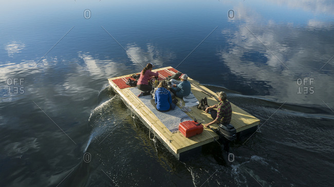 People on motor raft - Offset Collection