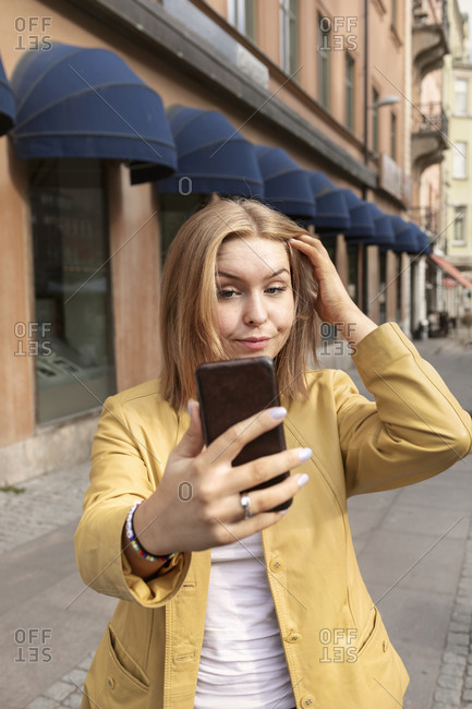 Teenage girl taking selfie - Offset Collection