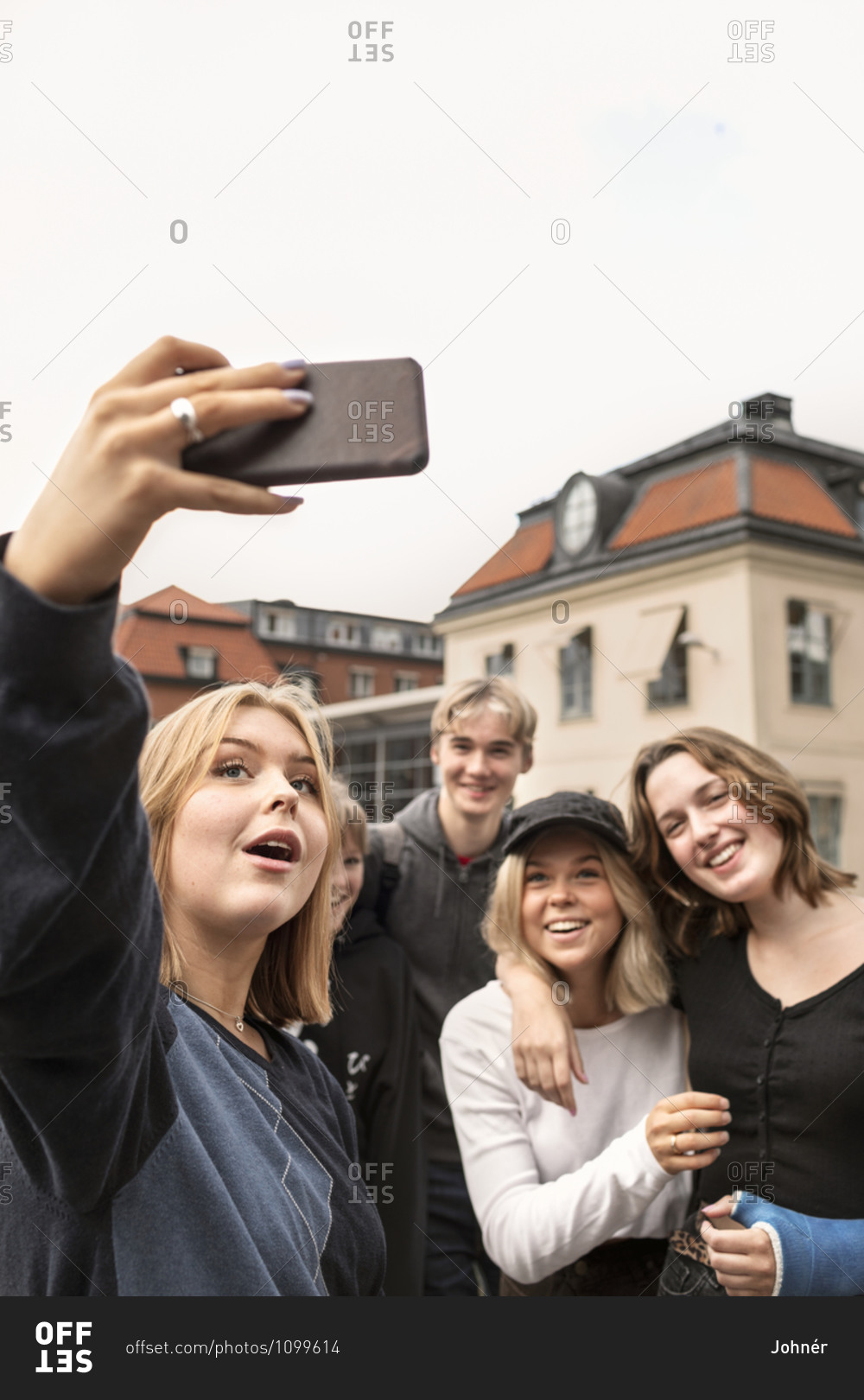 Smiling teenagers taking selfie - Offset Collection