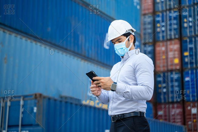 Business man wearing protective mask to Protect Against Covid-19